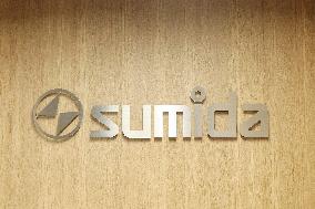 Sumida Corporation signboard and logo